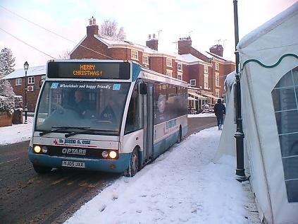 D Jones and Son C56 Bus Service between Wrexham and Chester stops on Farndon High Street outside The Farndon Pub